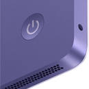 Achterkant van een iMac met rechts de mini-jack-aansluiting, ventilatie-openingen en aan/uit-knop