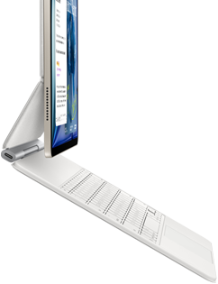 iPad Air, kleur Sterrenlicht, bevestigd aan Magic Keyboard, kleur wit, zijkant