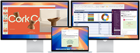 Opengeklapte MacBook Air met twee externe displays met diverse apps op het scherm
